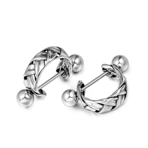Vintage silver braided twist hoop earrings with industrial metal texture and round ball ends