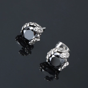 Boucles d'oreilles serpent gothiques avec pierre noire sur métal argenté poli