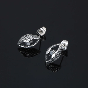 Vintage evil eye stud earrings in silver steel with black gemstone and scale texture