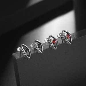 Men's titanium steel studs with devil's eye design and red black gemstones