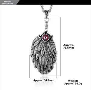 Detailed view of the feather pendant showing 76.5mm height and 34.2mm width dimensions