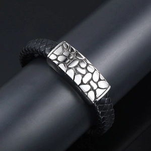 Fashionable woven leather bracelet with textured silver metal buckle for men and women