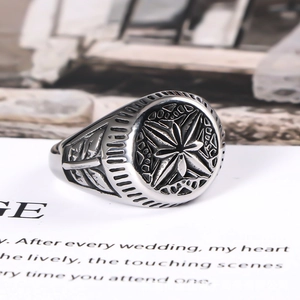 Vintage silver titanium steel signet ring featuring engraved star and leaf patterns