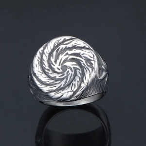 Punk style stainless steel ring with mushroom nail head and engraved swirl texture