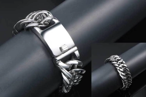 Close-up of titanium steel Cuban link bracelet showing the large rectangular clasp detail