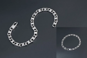 Close-up of silver chain bracelet with H-link design and lobster clasp closure
