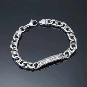 Men's punk stainless steel totem bracelet with mesh texture and lobster clasp on black mirror