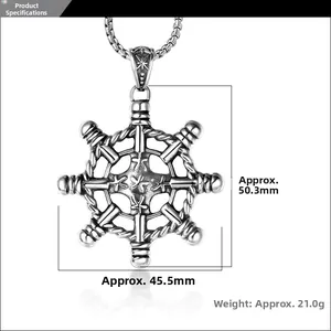 Macro view of vintage ship wheel pendant with detailed dimensions and measurements