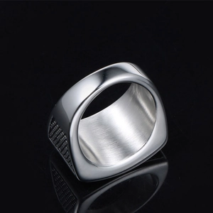 Polished silver punk star ring for men featuring detailed grid patterns and brushed finish
