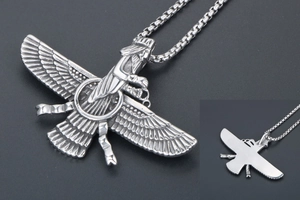 Detailed silver Faravahar pendant with intricate wings and engraved Persian symbol details