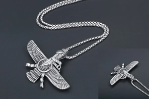 Detailed macro view of Faravahar pendant with oxidized silver finish and box chain