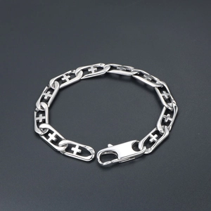 Silver titanium steel bracelet featuring cross cut-outs and punk style chain links