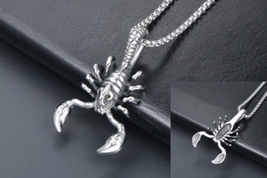 Detailed close-up of scorpion pendant with antique silver finish and smooth back detail