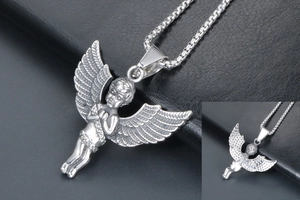 Close-up of a silver cherub angel pendant with detailed box chain on black leather