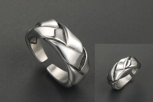 Macro shot of hip-hop braided stainless steel ring with adjustable open band detail