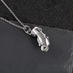 Vintage silver titanium steel Pixiu pendant necklace with ancient coin motifs on dark stone