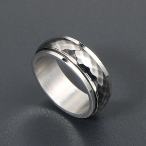 Vintage punk spinner ring with black hammered finish and rotatable inner band
