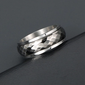 Vintage punk spinner ring with hammered finish and rotating inner band for men