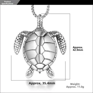 Detailed view of turtle pendant with measurements 42.9mm by 35.4mm and scale textures