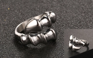 Macro view showing the polished sharp claw textures of the vintage punk steel ring