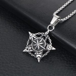 Retro titanium steel star necklace with skull and Flamel cross on black leather background