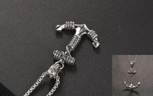 Close-up of vintage punk anchor pendant in titanium steel with detailed rope textures