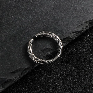 Fashionable wheat grain titanium steel open ring for men and women on black rock