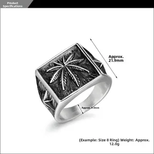 Macro detail of retro punk leaf relief on square face stainless steel men ring