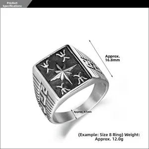 Macro shot showing dimensions and intricate Greek fret patterns on a retro male ring
