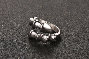Macro shot of mechanical joint ring featuring a vintage claw bone segmented design