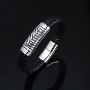 Men's braided black leather bracelet with silver wheat feather engraved clasp detail