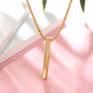 Minimalist gold square bar pendant necklace with polished box chain on display