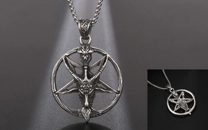 Detailed macro view of Baphomet goat head pendant with inverted pentagram design