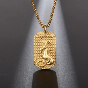 Collar dorado con colgante del zodiaco Capricornio en relieve y cadena de bolas unisex