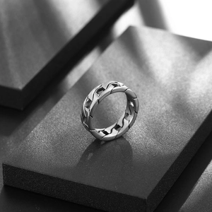 Polished silver cuban chain ring for men made of stainless steel on black display