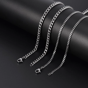 Detailed comparison of four polished silver titanium steel cuban link chains in varied sizes