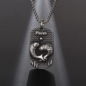 Collier pendentif signe Poissons vintage en acier titane noir avec texture relief