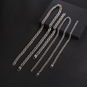 Set of five silver titanium steel anchor link chain necklaces in various widths for men and women