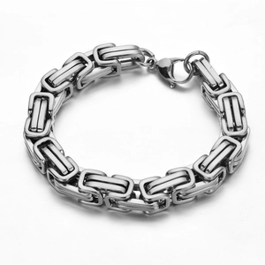 Close-up of silver titanium steel Byzantine chain bracelet with sturdy lobster clasp