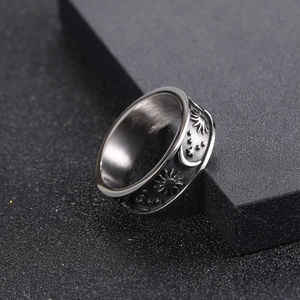 Celestial stainless steel ring with sun, moon, and stars embossed in vintage silver