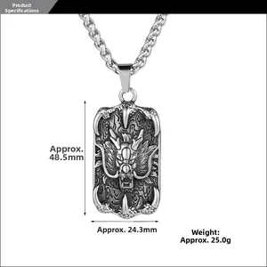 Macro view of vintage titanium steel dragon pendant with engraved details and measurements
