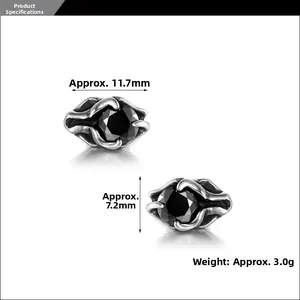 Detail shot of silver titanium steel earrings with black zircon measurements and weight