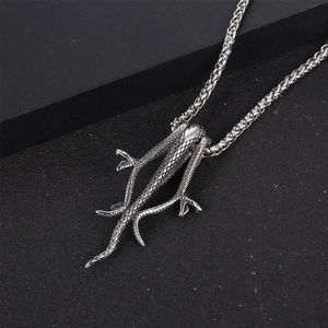 Vintage titanium steel mamba snake pendant necklace with textured scales on twist chain