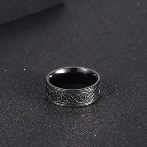 Nordic Viking style black titanium steel ring featuring intricate Celtic Knot relief texture
