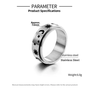 Detailed view of stainless steel ring showing celestial patterns and 7.6mm width