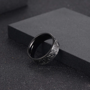 Nordic Viking black titanium steel ring featuring intricate Celtic knot engravings for men