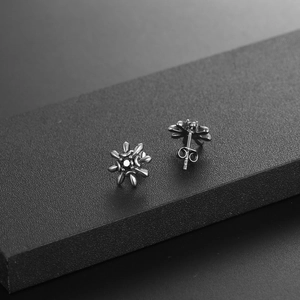 Titanium steel sunflower stud earrings with dark zircon inlay for women in dark grey