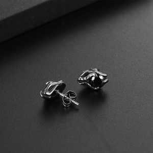 Gothic style titanium steel earrings with black zircon stones in a retro claw setting