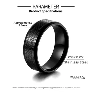 Detail view of titanium steel ring with grid texture showing 7.6mm width and 7.0g weight