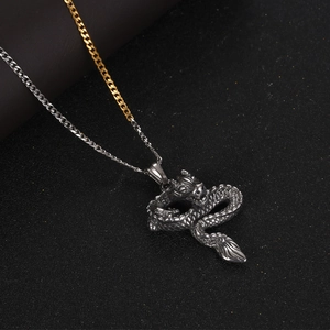 Vintage dragon pendant necklace in black silver finish with two-tone gold and silver chain